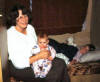 Connie with our daughters in our Caravan (trailer) while living in Germany.